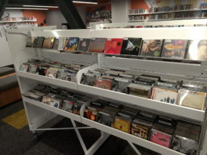 A picture of a shelf full of Wellington CDs available at Te Awe library.