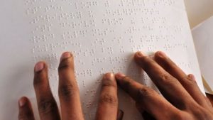 World Braille Day: Everything you need to know from the BBC. Hands on a Braille page.