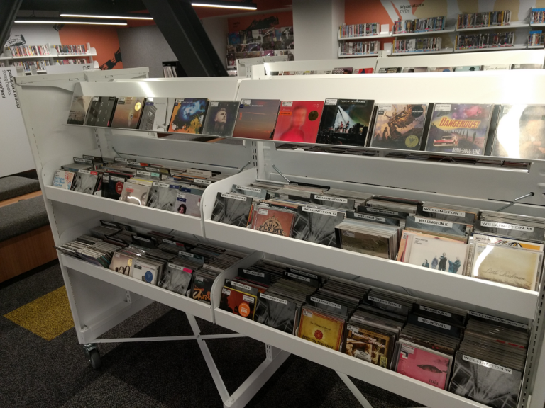 Shelves at Te Awe Library full of Wellington CDs