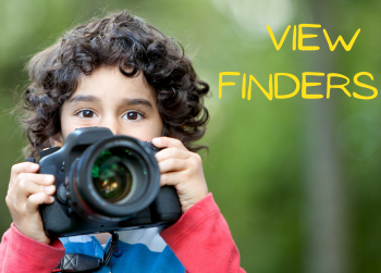 View Finders - Child with a DSLR camera