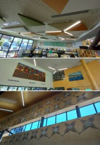 Three pictures in a collage. Top: view of the children's area and the coloured triangular pieces of sound-baffling fitting in with the three-pronged lights. Centre: Looking up towards artworks by Robin Kahukiwa and Melvin Day. Bottom: Woven harakeke artwork Whetūrangi on the wall above and below a long window.